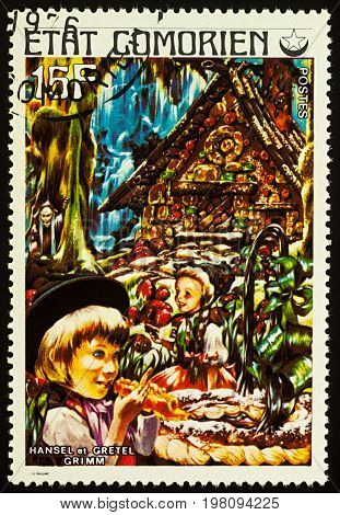 Moscow Russia - August 02 2017: A stamp printed in Comoros shows scene from a fairy tale Hansel and Gretel series 