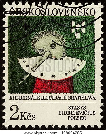 Moscow Russia - August 2 2017: A stamp printed in Czechoslovakia shows Pinocchio by Stasys Eidrigevicius Poland series 