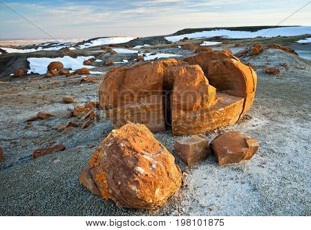 Unusual round red boulders in Red Rock Coulee in Southern Alberta, Canada.