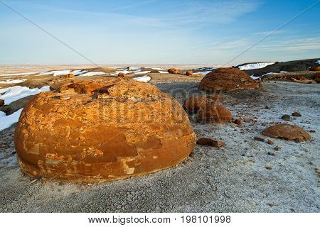 Unusual round red boulders in Red Rock Coulee in Southern Alberta, Canada.