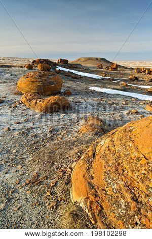 Unusual round red boulders in Red Rock Coulee in Southern Alberta, Canada.