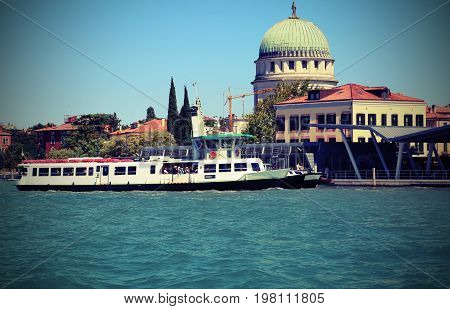 Lido Of Venice In Italy And The Passenger Ferry Boat On A Hot Da