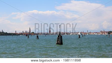 Skyline Of Venice Island In Italy By Boat In The Middle Of The S