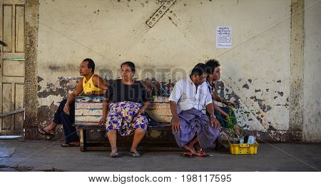 People Waiting At Train Station In Yangon, Myanmar