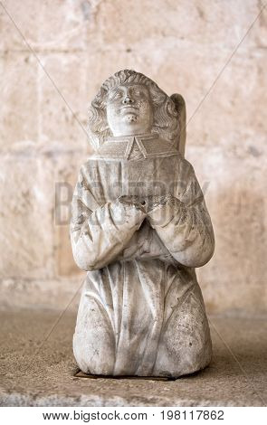 Statue of angel in the cloisters of the Abbey of Montmajour near Arles France