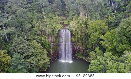 Waterfall and rainforest. Aerial view of Millaa Millaa Falls in Queensland, Australia