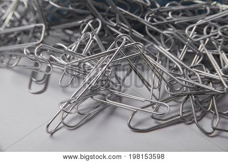 Paper clips closeup on the office table