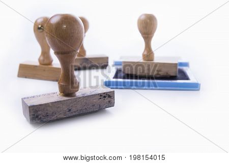 Old rubber stamp and pad on the white background