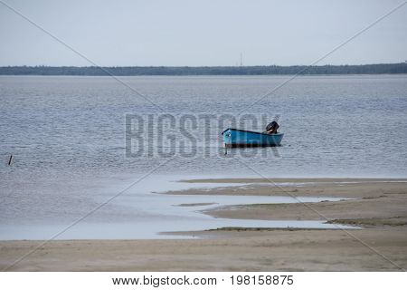 Fishing boat in the bay at Bloeden Hale Laesoe Island in Kattegat sea Denmark.