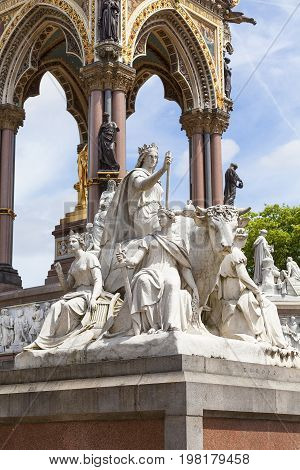 Prince Albert Memorial Kensington Gardens sculpture at the base of the monument London United Kingdom. It was commissioned by Queen Victoria in memory of her husband opened in July 1872