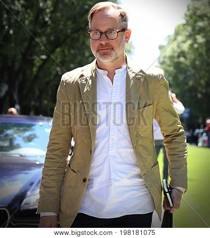 MILAN- 19 June 2017 Bruce Pask on the street during the Milan Fashion Week