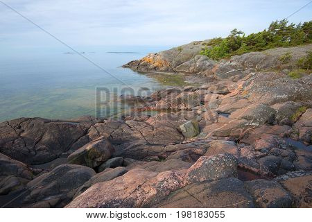 Cloudy summer morning on the rocks of the peninsula of Hanko. Finland