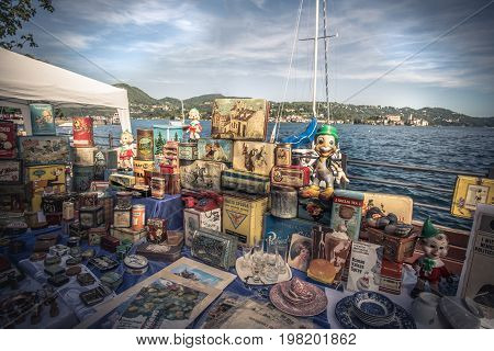 Pella Italy May 21 2017: vintage markeplace stand on lake orta