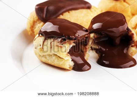 Traditional French Dessert. Eclair With Chocolate Icing. Pastery Concept
