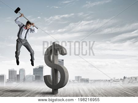 Young furious businessman going to crash with hammer stone dollar symbol. 3D rendering.