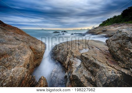 Stunning Sunset On The Beach And Dramatic Clouds At The Sky. Hdr (high Dynamic Range) Picture.