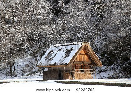 A thatched Gassho Zukuri storehouse on a farm in Shirakawa-go