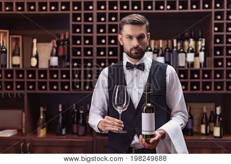Sommelier With Wine And Glass