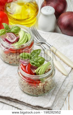 Warm Quinoa Salad With Vegetables - Avocado, Red Onion, Tomatoes, Bell Pepper, Basil And Olive Oil.