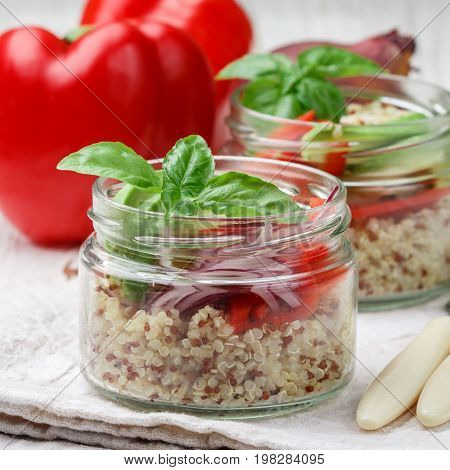 Warm Quinoa Salad With Vegetables - Avocado, Red Onion, Tomatoes, Bell Pepper, Basil And Olive Oil.