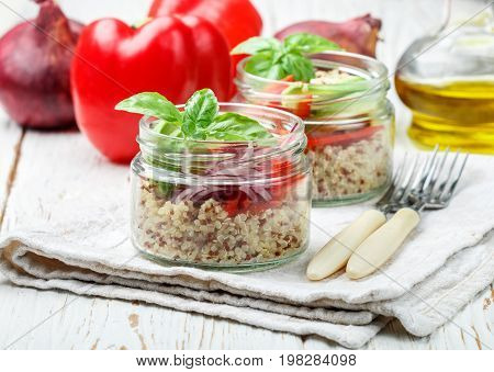 Warm Quinoa Salad With Vegetables - Avocado, Red Onion, Tomatoes, Bell Pepper, Basil And Olive Oil.