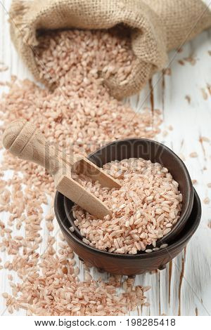 Raw Organic Devzira Rice On A White Table