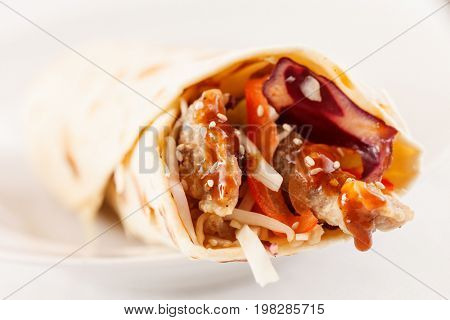 tortilla fajita wraps with meat and vegetables