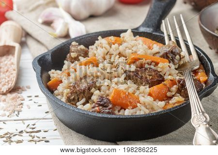 Devzira Pilaf With Lamb, Onions, Carrots And Spices (cumin, Coriander, Pepper). Traditional Dishes O
