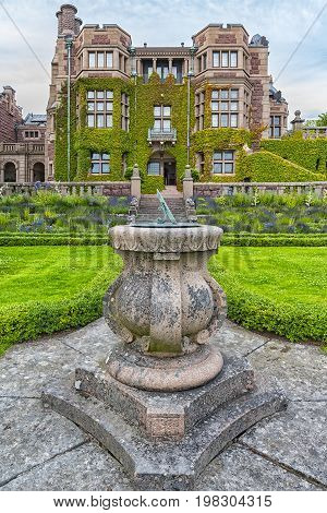 Tjolöholm Manor is a building in Tudor Style erected around the turn of the 20th century by the Scottish family Dickson.
