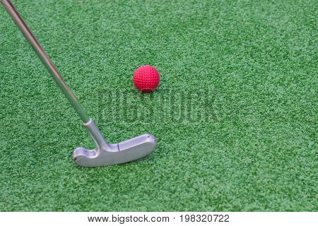 Red Golf Ball On Golf Course