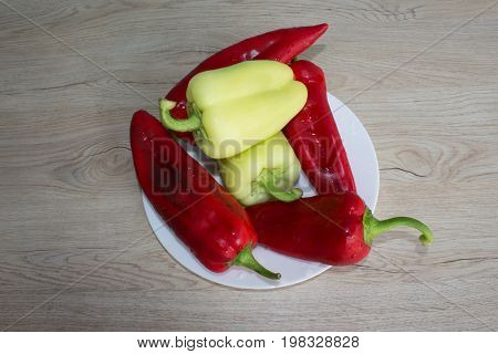 Red bell pepper backgro and Green Peppers. Fresh organic vegetables on table. Green and red bell pepper backgro