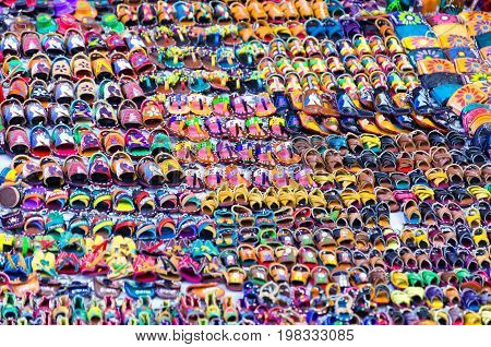Children's sandals for sale in a street in downtown Oaxaca Mexico