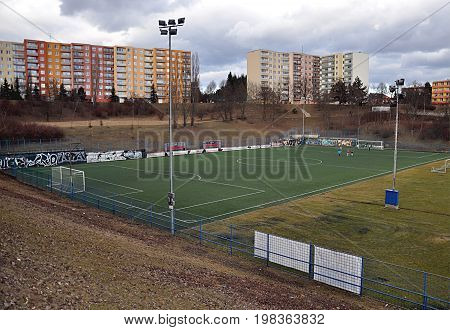 Football playgrounds and housing estates throughout the day