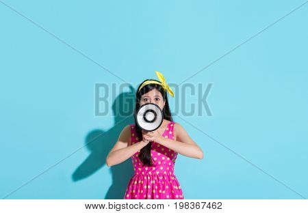 Girl Wearing Cute Dress On Blue Background