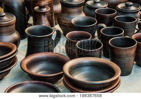 A Differnet Types Of A Clay Crockery On A Table