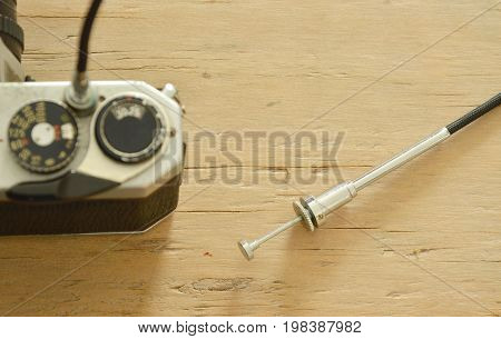 classic shutter cable released operated on film camera ready to shooting