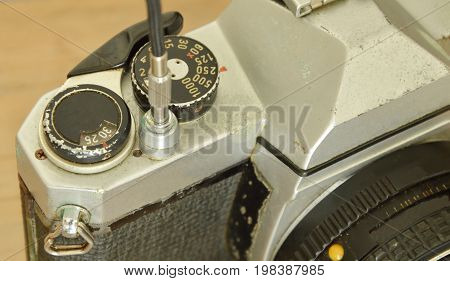 classic shutter cable released operated on film camera ready to shooting
