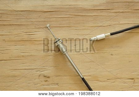 classic camera shutter cable released on wooden board