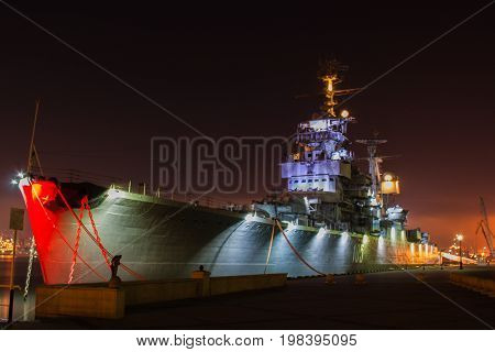 Novorossiysk Russian federation - June 20, 2016 Moored cruiser Mikhail Kutuzov in the port night