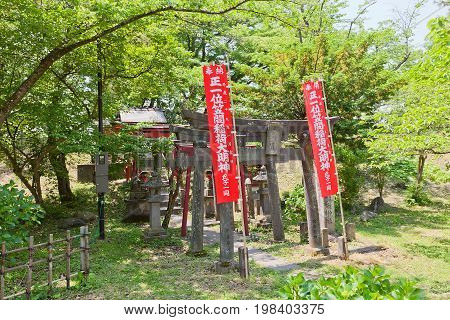 AIZUWAKAMATSU JAPAN - MAY 30 2017: Inari Shinto Shrine in Aizu-Wakamatsu Castle Japan. Inari is goddess of fertility rice tea sake agriculture industry general prosperity and worldly success