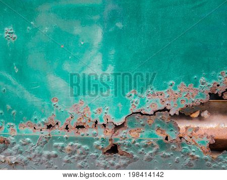 Grunge old crack and rusty metal plate texture blackground rusty car close up