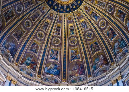 Rome, Vatican, Italy - July, 2, 2017: fragment of the ceiling list in St. Peter's Cathedral in Vatican, Rome, Italy