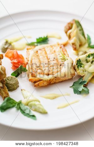 salmon steak with vegetables