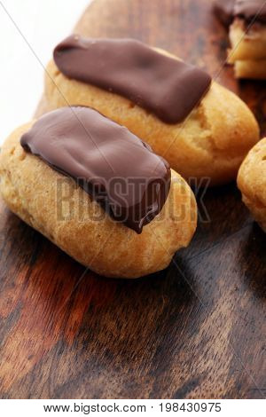 Traditional French Dessert. Eclair With Chocolate Icing. Pastery