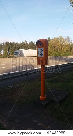 SOS phone/This is a emergency phone on the road.