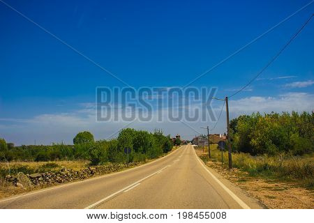 Autovía N-631. Road, horizon, car. Spain. Picture taken - 29 july 2017.