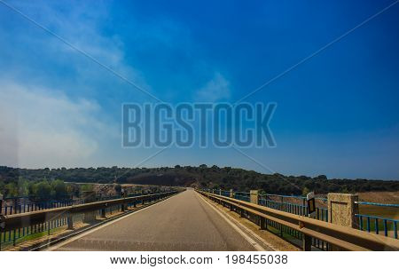 Autovía N-631. Road, horizon, car. Spain. Picture taken - 29 july 2017.
