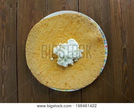 Guirila With Crumbled White Cheese.