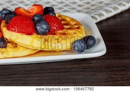 Belgian Waffles With Strawberries, Blueberries And Syrup, Homemade Healthy Breakfast