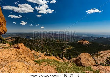 Pikes Peak is the highest summit of the southern Front Range of the Rocky Mountains. The ultra-prominent fourteener is located in Pike National Forest 12 miles west of downtown Colorado Springs. The mountain is named in honor of American explorer Zebulon